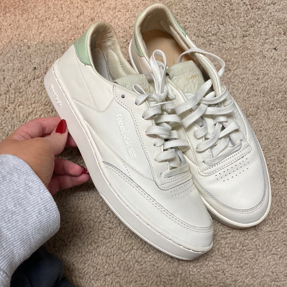 White leather Reebok shoes